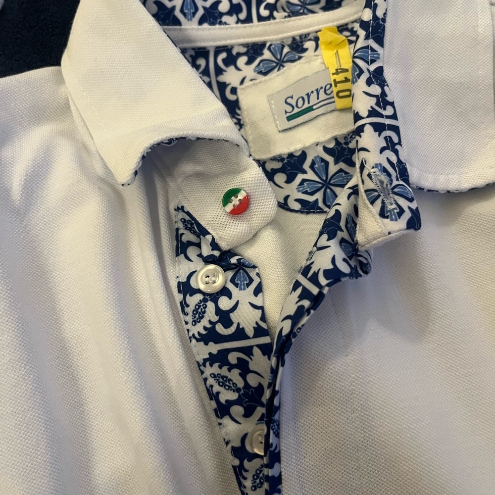 Absolutely gorgeous Sorrento Blue and White Patterned Polo shirt size is a large